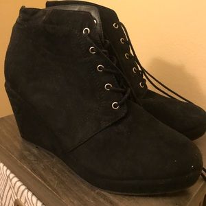 Black wedge booties